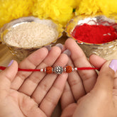 Bali Flower Design With Dual Rudraksha Silver Rakhi